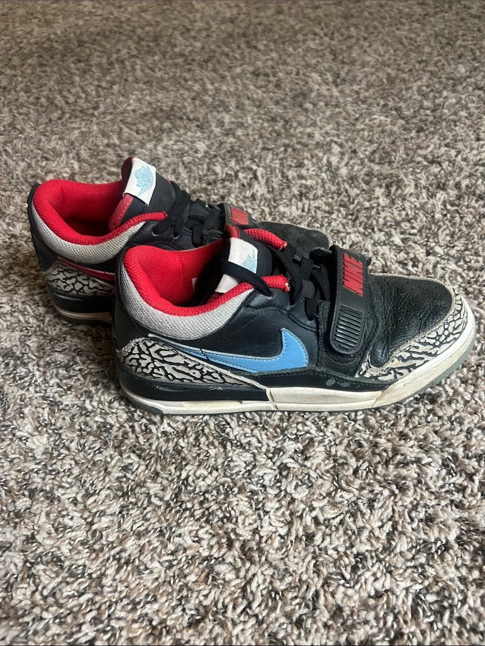 Nike Jordans Kids Black and Red Strap Sneakers with Elephant Print
